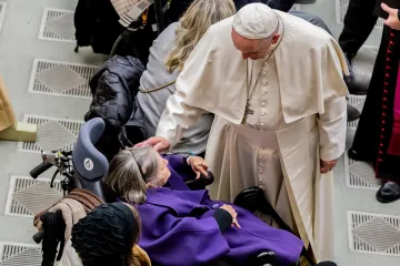 Pope Francis with an elderly woman